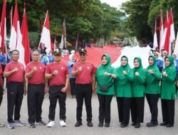 Peringati HUT Ke-81 TNI, Kodam IM Gelar Kirab Merah Putih dan Bentangkan Bendera 81 Meter